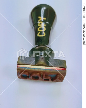 Rubber stamp for stamping the word copy placed on the paper 108960679