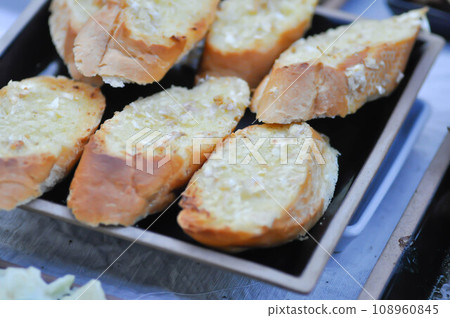 garlic bread, bread or toast with butter topping garlic bread, bread or toast with butter topping 108960845