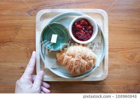 croissant ,French croissant or chocolate croissant or French bread with butter and blueberry dressing 108960848