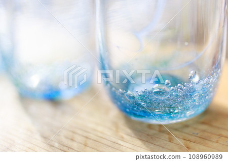 The bottom of a cup made of blown glass The bottom of a cup made of blown glass 108960989