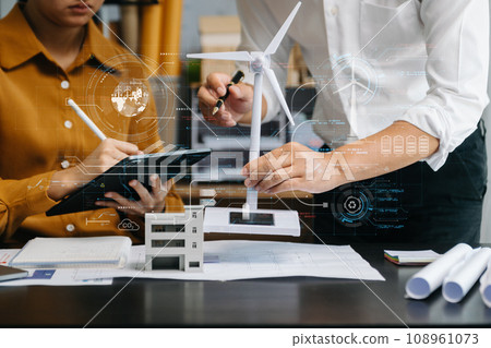 ESG concept of environmental, Green ethical business preserving resources, reducing CO2, Business person team working on laptop virtual smartphone to reduce CO2 emissions carbon . ESG concept of environmental, Green ethical business preserving resources, reducing CO2, Business person team working on laptop virtual smartphone to reduce CO2 emissions carbon . 108961073