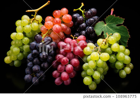 different types of grapes of various colors isolated on black background 108963775