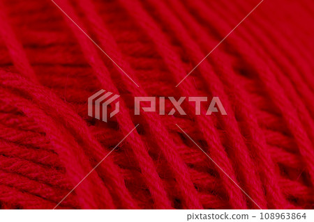 woolen threads of red color for knitting knitting close-up 108963864