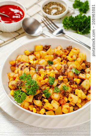 Beef Hash with roasted corn, garlic and parsley 108963881
