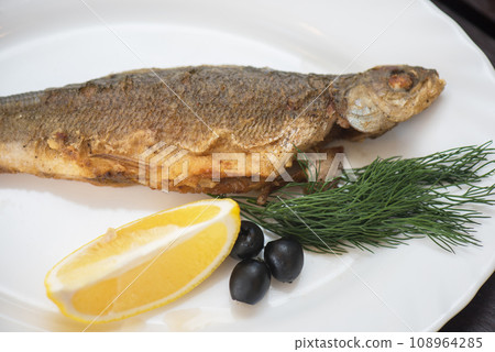 Fried grayling fish 108964285