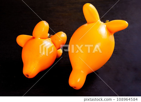 Fox face fruit black background Fox face fruit black background 108964584