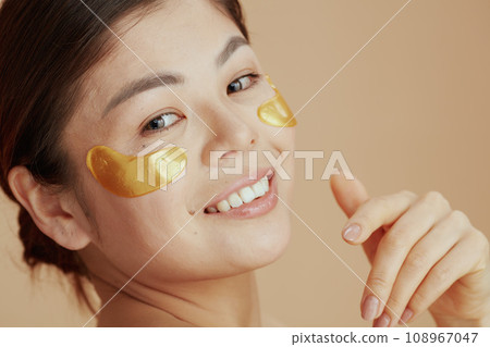 Portrait of modern asian woman with eye patches 108967047
