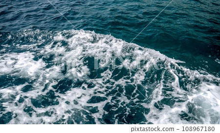 View from the ship on splashing ocean waves on cold stormy day View from the ship on splashing ocean waves on cold stormy day 108967180