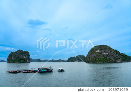 A boat for people living on the water in Ha Long Bay, Vietnam A boat for people living on the water in Ha Long Bay, Vietnam 108971059