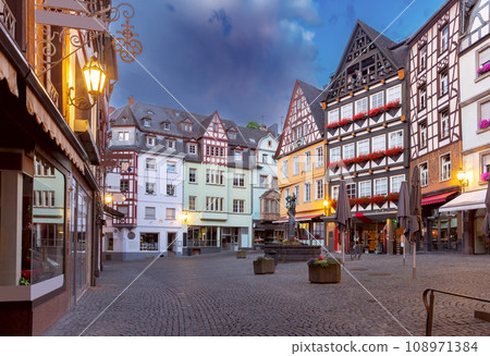 Facades of old traditional houses in the market square at dawn. Cochem. Germany. 108971384