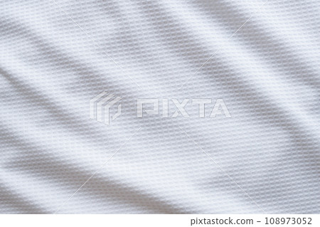 White sports clothing fabric football shirt jersey texture abstract background White sports clothing fabric football shirt jersey texture abstract background 108973052