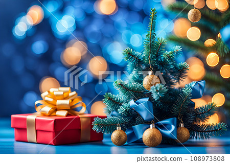 Christmas gift box and christmas decoration on wood background. Bokeh light. Christmas gift box and christmas decoration on wood background. Bokeh light. 108973808