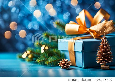 Christmas gift box and christmas decoration on wood background. Bokeh light. 108973809