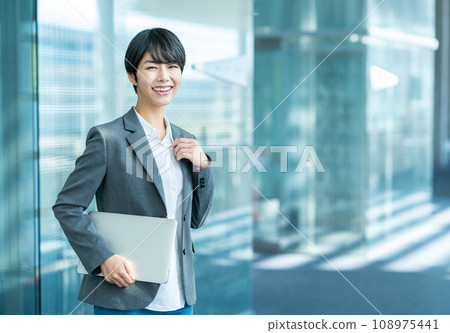 Business woman with laptop Business woman with laptop 108975441
