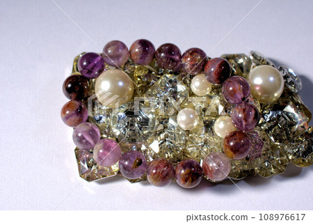 Bracelet and glitter decoration Bracelet and glitter decoration 108976617
