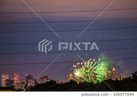 Japan's Tokyo cityscape Tama River Fireworks Festival for the first time in four years. The 45th Setagaya Ward Tamagawa Fireworks Festival venue side/Tokyo Metropolitan Government Building in the back = 21st 108977899