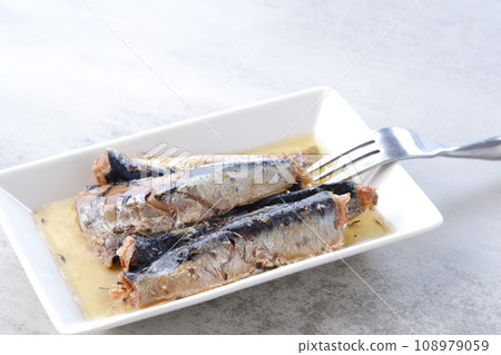 Oil sardines with fresh sardines marinated in olive oil Oil sardines with fresh sardines marinated in olive oil 108979059