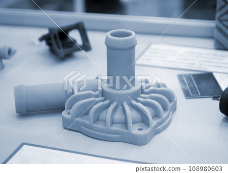 Abstract art object printed on 3D printer from photopolymer. SLA. Model 3D printed from liquid photopolymer resins. Concept progressive additive 3D printer printing technology. Sla-printing. Gray blue Abstract art object printed on 3D printer from photopolymer. SLA. Model 3D printed from liquid photopolymer resins. Concept progressive additive 3D printer printing technology. Sla-printing. Gray blue 108980603