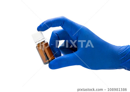 Hand with medical glove holding pill bottle Hand with medical glove holding pill bottle 108981386