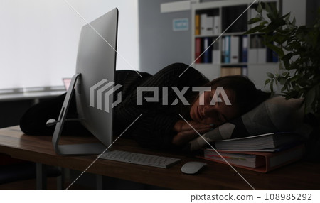 Woman wants to go home and lives at work 108985292