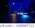 Light trails of cars running in the city at night 108985712
