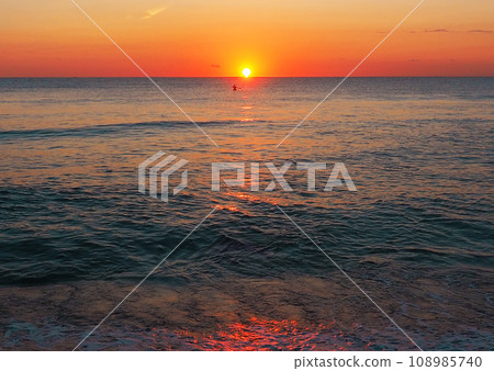 Stunning Sea Sunset in Spain Stunning Sea Sunset in Spain 108985740