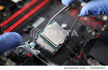 Man working with computer equipment Man working with computer equipment 108986083