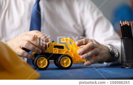 Architect handling bulldozer 108986265