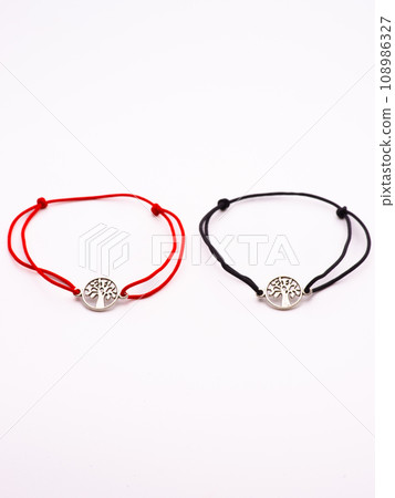 two pair bracelets are made of Korean rope and there is a love emblem that can be fused because there are magnets in it. two pair bracelets are made of Korean rope and there is a love emblem that can be fused because there are magnets in it. 108986327
