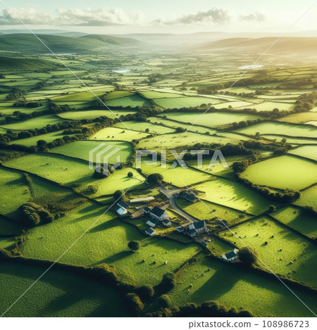Aerial view of endless lush pastures and farmlands of Ireland. countryside with fields and meadows. Aerial view of endless lush pastures and farmlands of Ireland. countryside with fields and meadows. 108986723