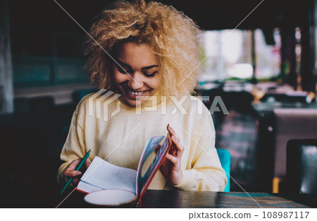 positive dark skinned hipster girl enjoying time for autodidact 108987117