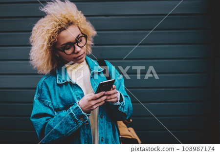 attractive female student searching media file attractive female student searching media file 108987174