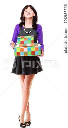 Woman carrying moving boxes. Young woman with box isolated 108987706