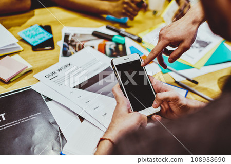 businessman holding mobile phone sending text message via application and 4G connection 108988690