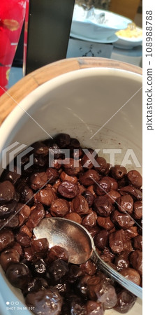 Olives in beautiful dishes in the assortment of a restaurant in one of the hotels in Turkey Olives in beautiful dishes in the assortment of a restaurant in one of the hotels in Turkey 108988788