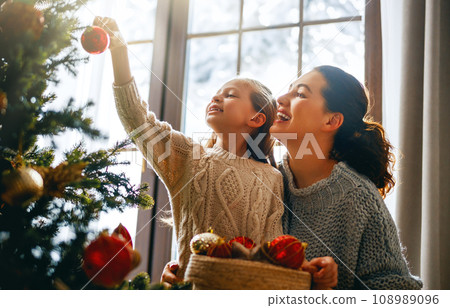 family celebrating Christmas 108989096