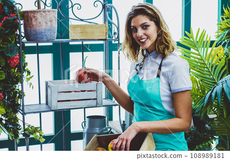successful owner of greenery checking fruit harvest 108989181
