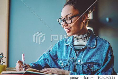 Cheerful female blogger feeling excited from creating interesting idea for content to next publication 108989314