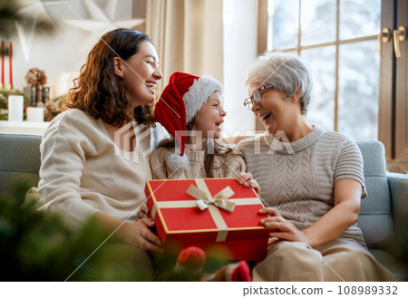 family celebrating Christmas family celebrating Christmas 108989332