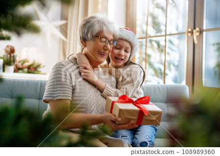 family celebrating Christmas 108989360