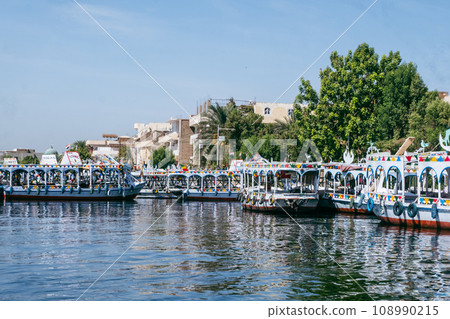 Scenic View of Luxor Port from a Small Boat Egypt Summer Travel Scenic View of Luxor Port from a Small Boat Egypt Summer Travel 108990215