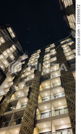 Tall building perspective during night time, business background, business template background, presentation background 108990672