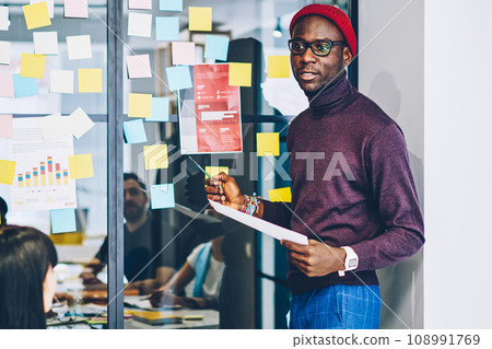 professional coach making workshop for group of students in coworking office 108991769