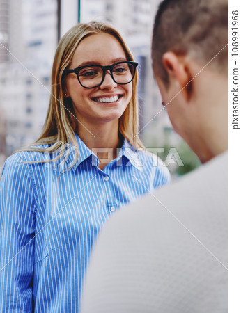 positive hipster girl talking with colleague in office positive hipster girl talking with colleague in office 108991968