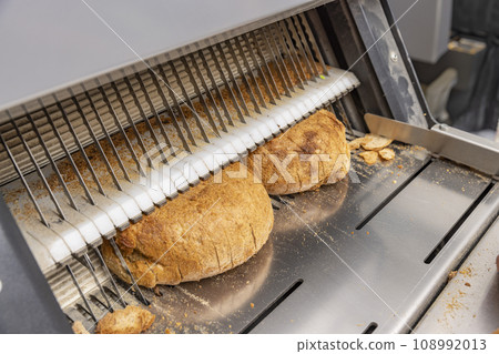 Bread slicing machine. 108992013
