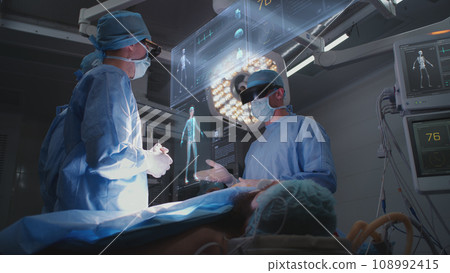 3D graphics of holographic display showing vital signs during surgery 108992415