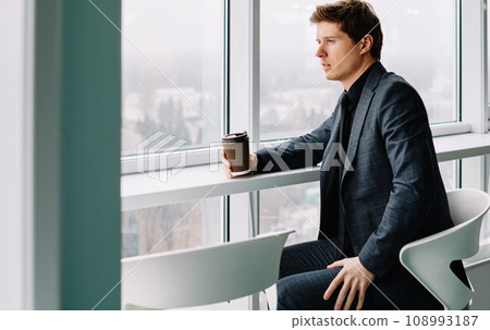 caucasian businessman having break in loft interior office thinking about future of corporation 108993187