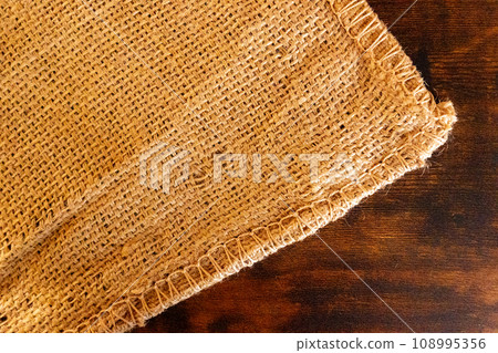Hemp sack and vintage floorboards Hemp sack and vintage floorboards 108995356