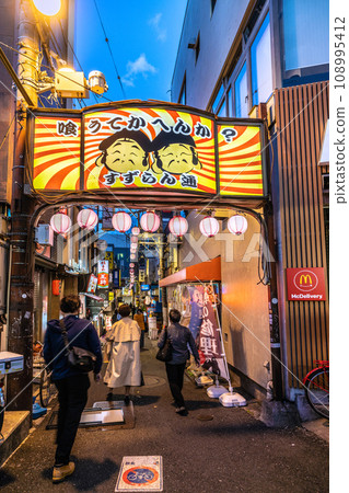 Tokyo, Japan cityscape November. Free from the coronavirus, strong winds... A view of the busy bar district "Suzuran Dori" right next to Sangenjaya Station Tokyo, Japan cityscape November. Free from the coronavirus, strong winds... A view of the busy bar district "Suzuran Dori" right next to Sangenjaya Station 108995412