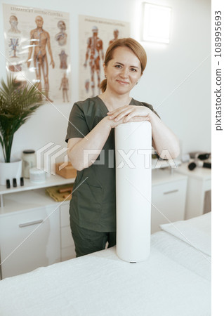 happy female massage therapist in massage cabinet happy female massage therapist in massage cabinet 108995693